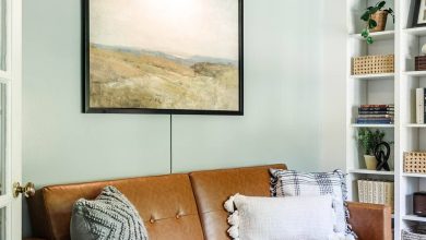 home office lounge area with faux leather futon