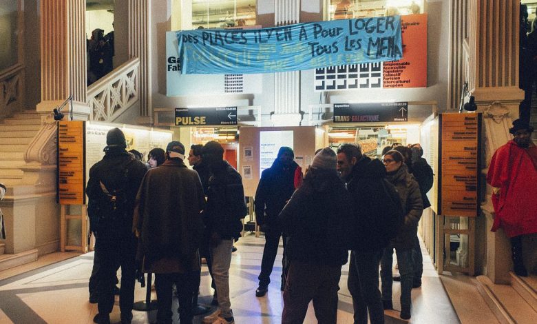 Iconic Paris venue struggles as 350 young migrants protest by sleeping in hallways