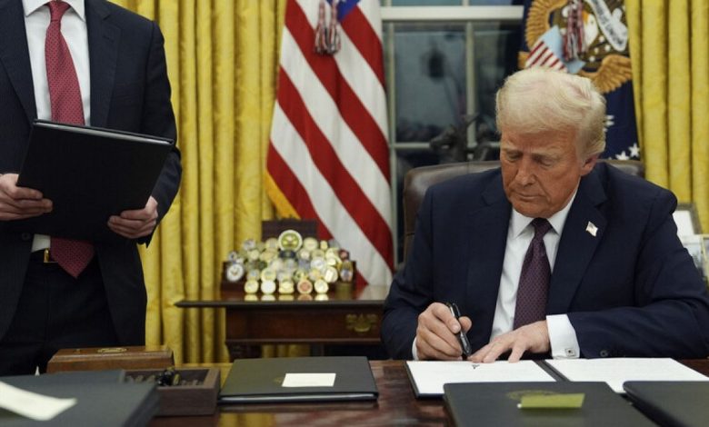 Trump pardons 6 January perpetrators as he signs slew of executive orders on first day in office