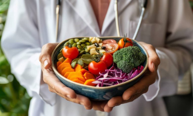 A doctor holding a plate of food