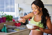 A woman having breakfast