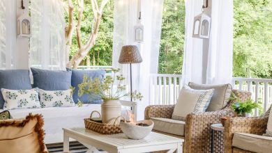 outdoor living room with fireplace on a back porch