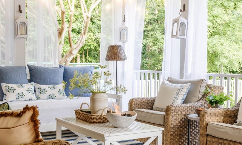 outdoor living room with fireplace on a back porch