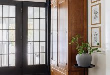 armoire coat closet in an entryway for storage without a mudroom