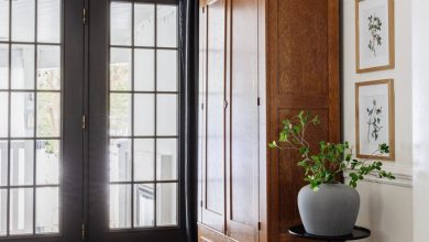 armoire coat closet in an entryway for storage without a mudroom