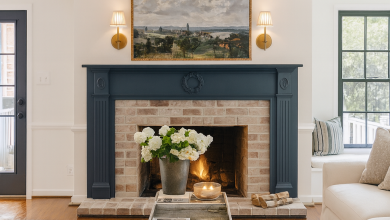 AI living room mockup using ChatGPT to create a creamy white living room with black doors and navy blue fireplace mantel